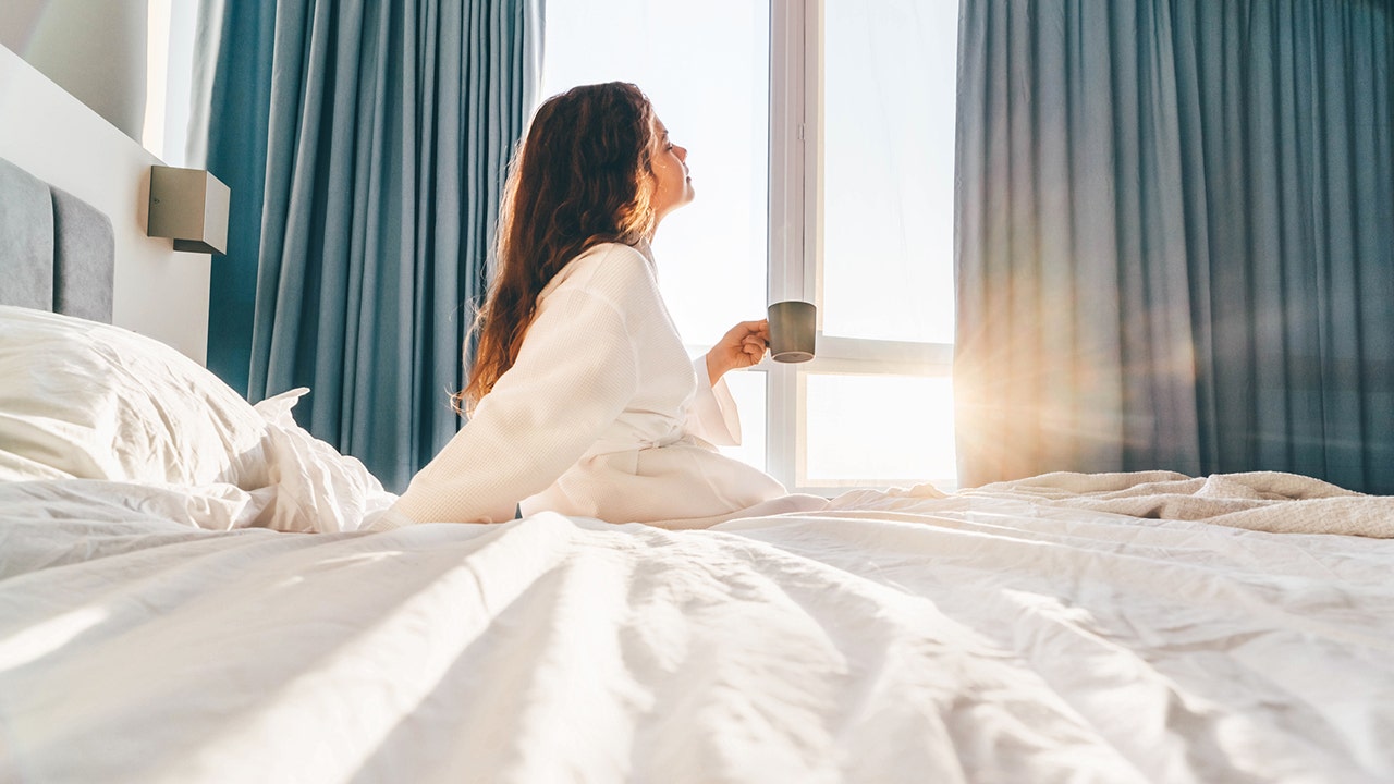 'Hurkle-durkling' is a viral travel trend that involves staying in bed all day
