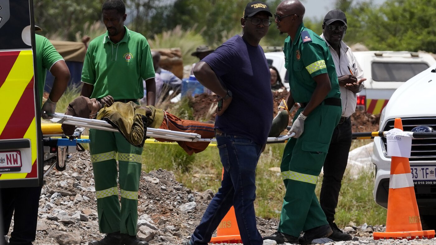 Dozens of survivors and dead rescued from abandoned mine in South Africa: NPR