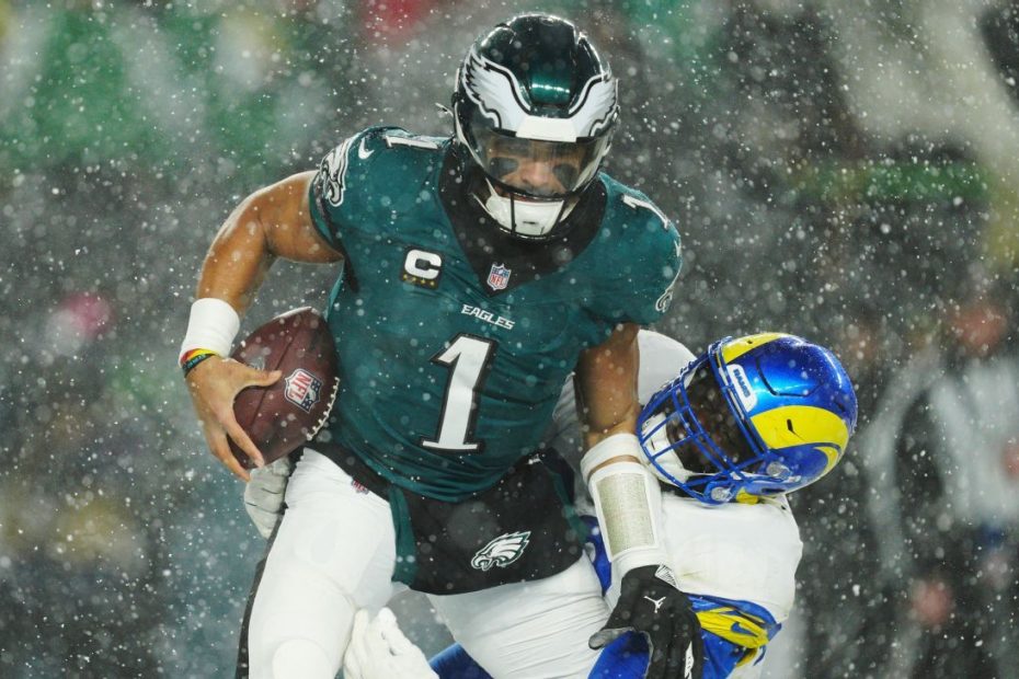 Eagles travel through snow, Rams advance to NFC Championship Game
