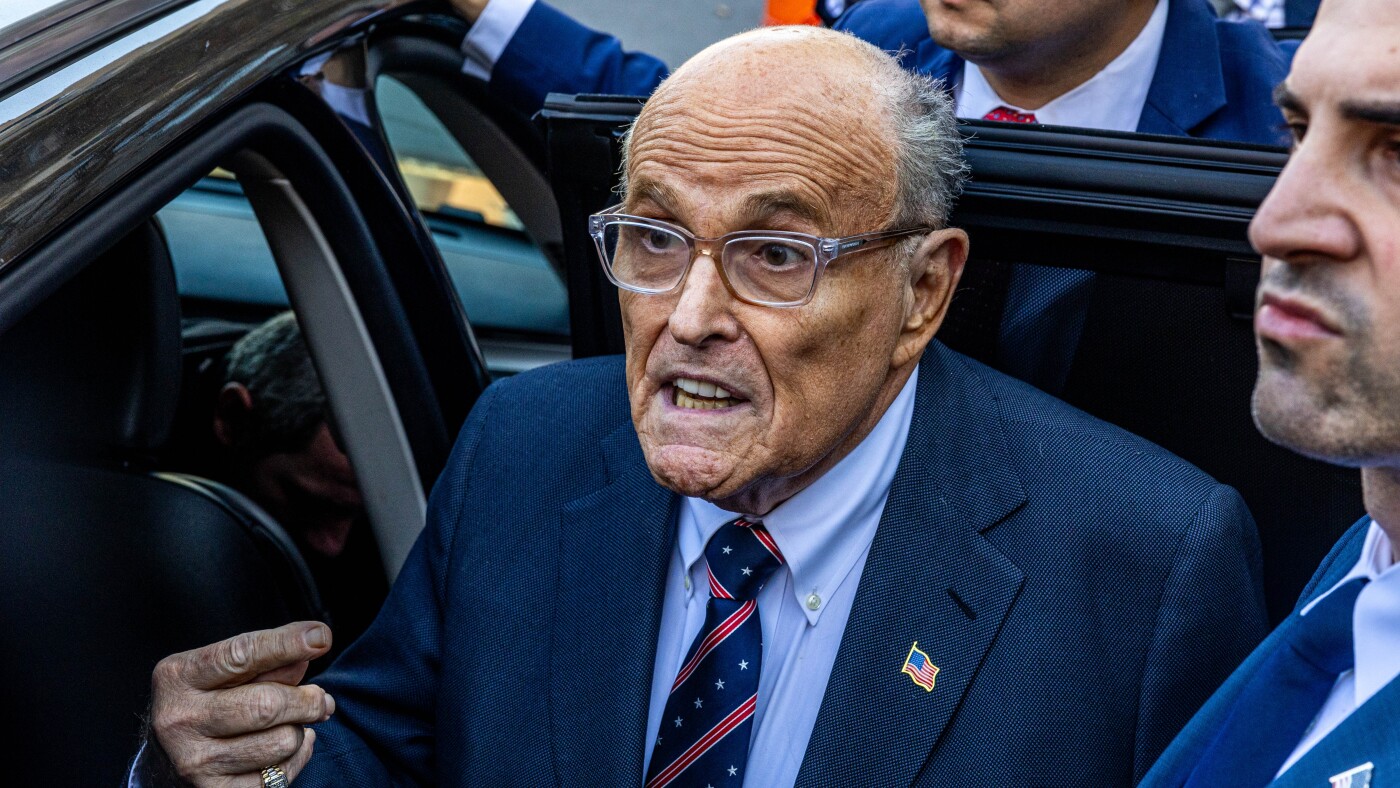 Giuliani absent from Manhattan federal trial: NPR