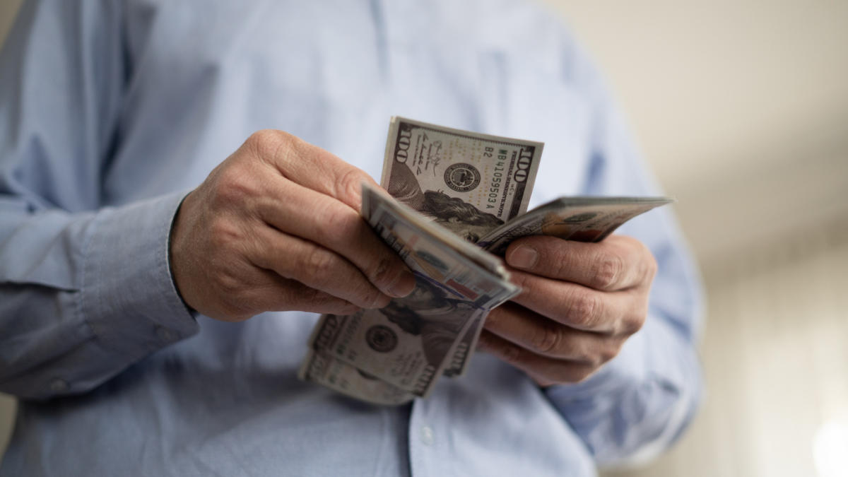 I'm 58 years old and have $1.7 million in my 401(k). Should I start converting 10% of my funds each year to a Roth IRA immediately to avoid RMDs and taxes?
