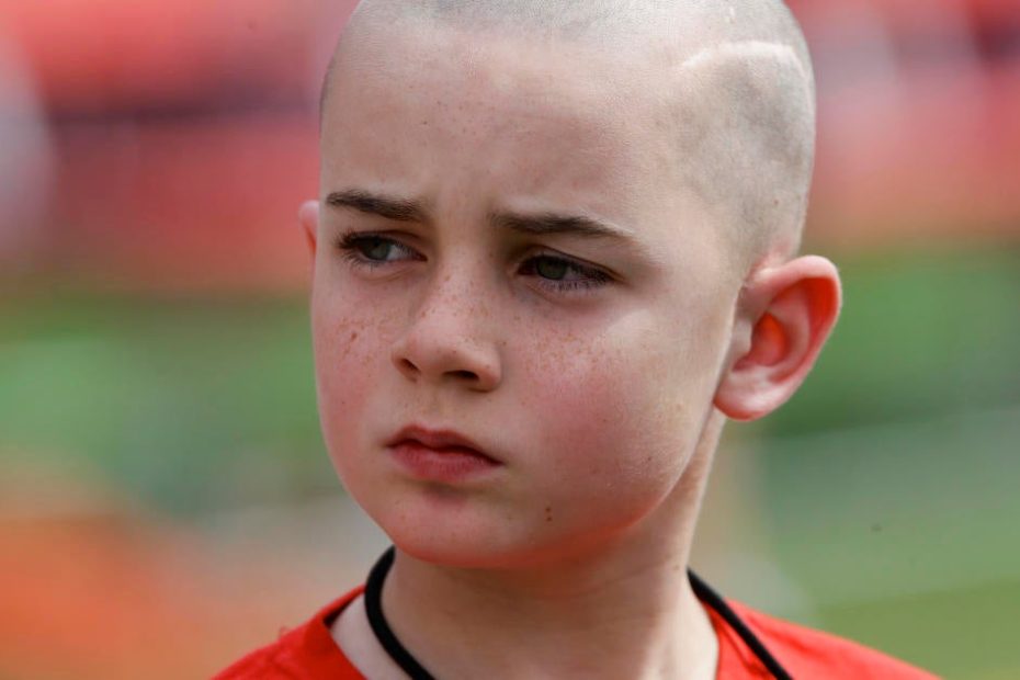 Jack Hoffman, the young cancer patient who captured the hearts of Nebraska fans with his touchdown run, dies at 19
