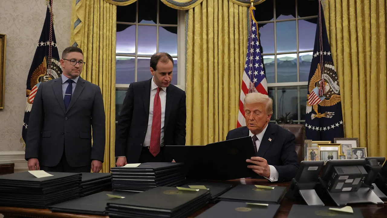 Trump revokes security clearances of 51 national security officials