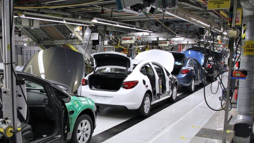 U.S. auto industry sales will rebound to 16 million vehicles in 2024 as General Motors, Ford and Toyota push for electrification