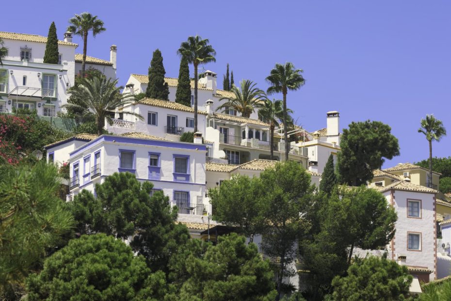 Why does Spain plan to impose a 100% tax on homes purchased by non-EU residents?