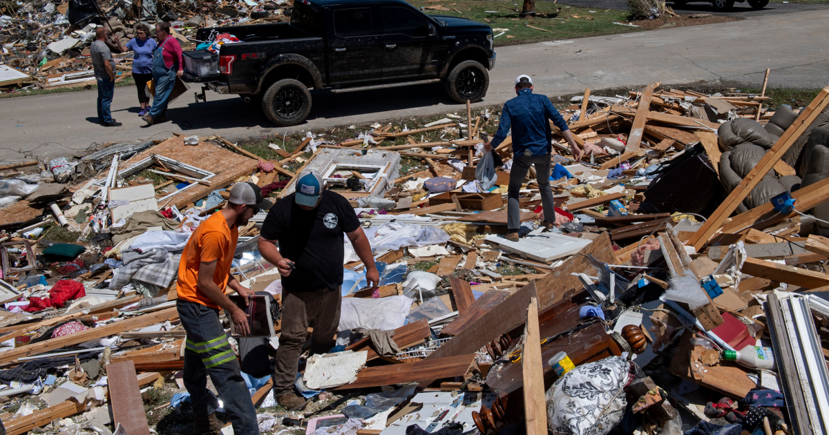 At least 25 people died as tornadoes and thunderstorms destroyed parts of Kentucky, Missouri