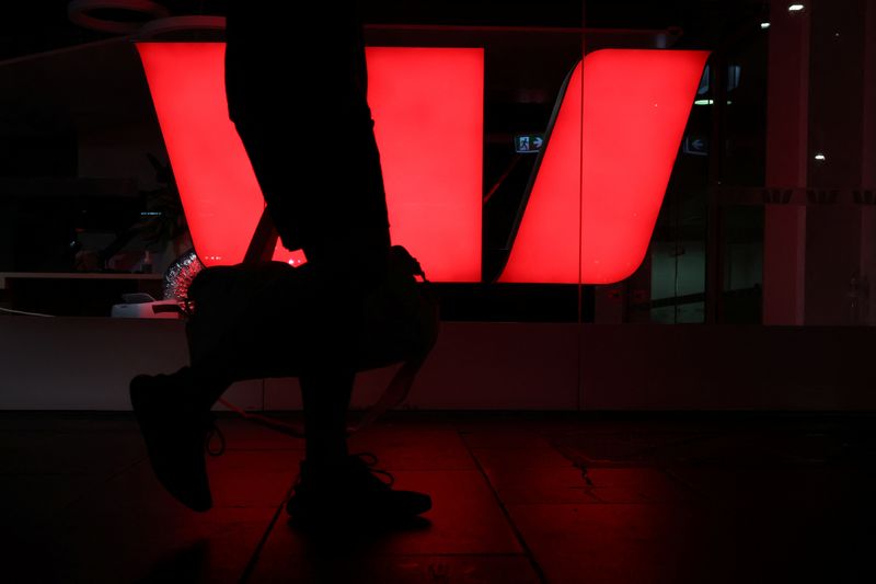 Australia's Westpac flag global trade risk, stocks glide after profit mistakes