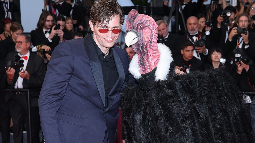Birdman walks on the Cannes red carpet at the premiere of “Die, My Love”