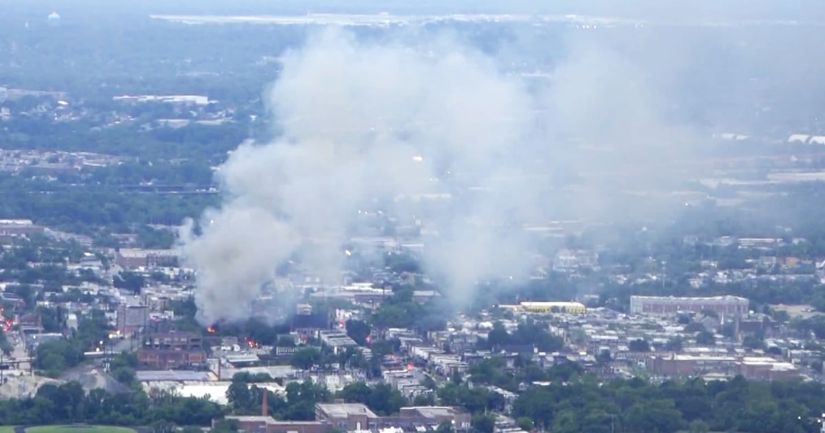 Fire out of control in vacant mattress warehouse in Baltimore