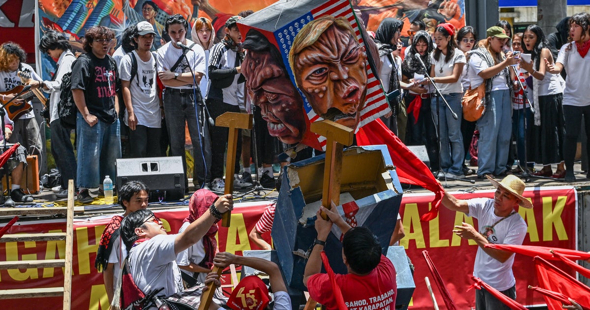 Photos of Mayday protests around the world as Trump looms