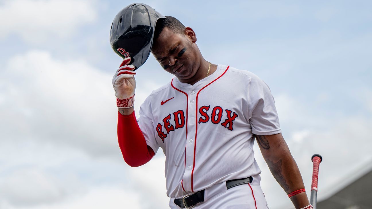 Red Sox owner John Henry meets Rafael Devers in remarks