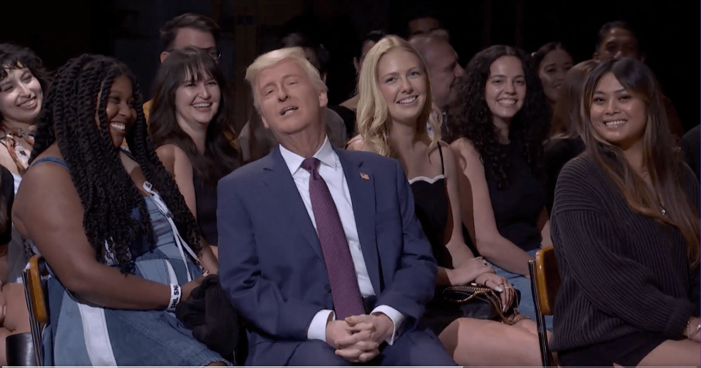 SNL's Trump leaves sketch flirting with female audience