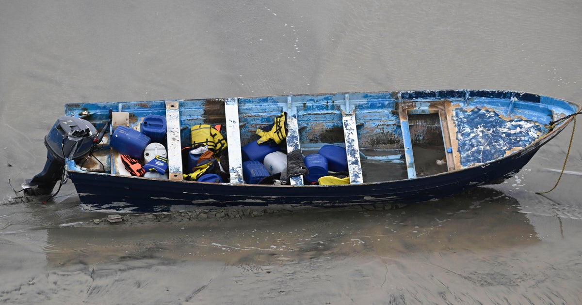 The boat tilted on San Diego beach, killing at least three people; the Coast Guard suspended search for seven other missing persons
