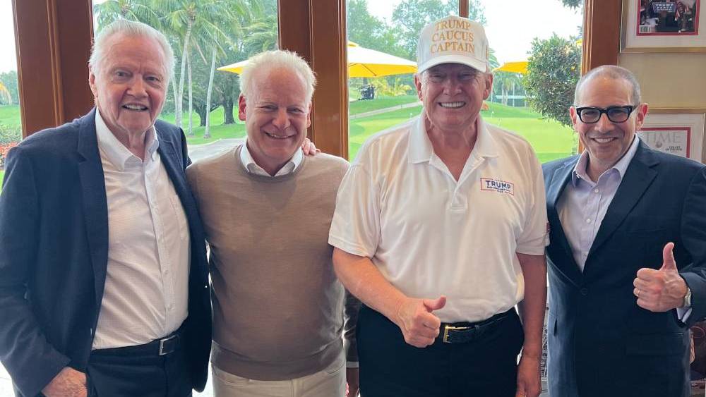 Trump whispers Steven Paul and Scott Karol